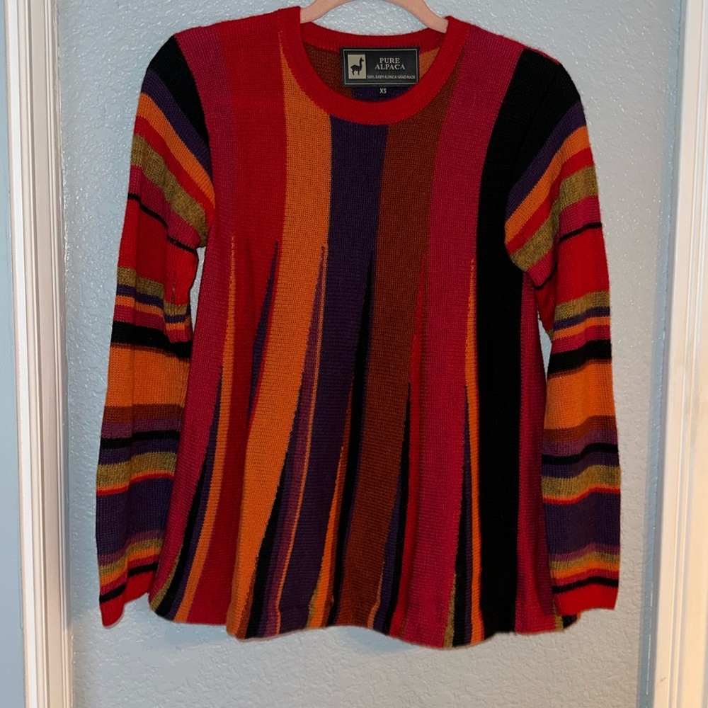 Beautiful contemporary sweater made of pure fine colourful baby alpaca. XS size